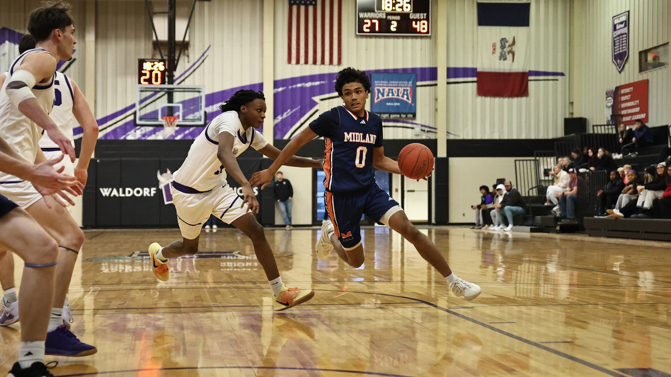 Midland Cruises Past Waldorf in Road Victory