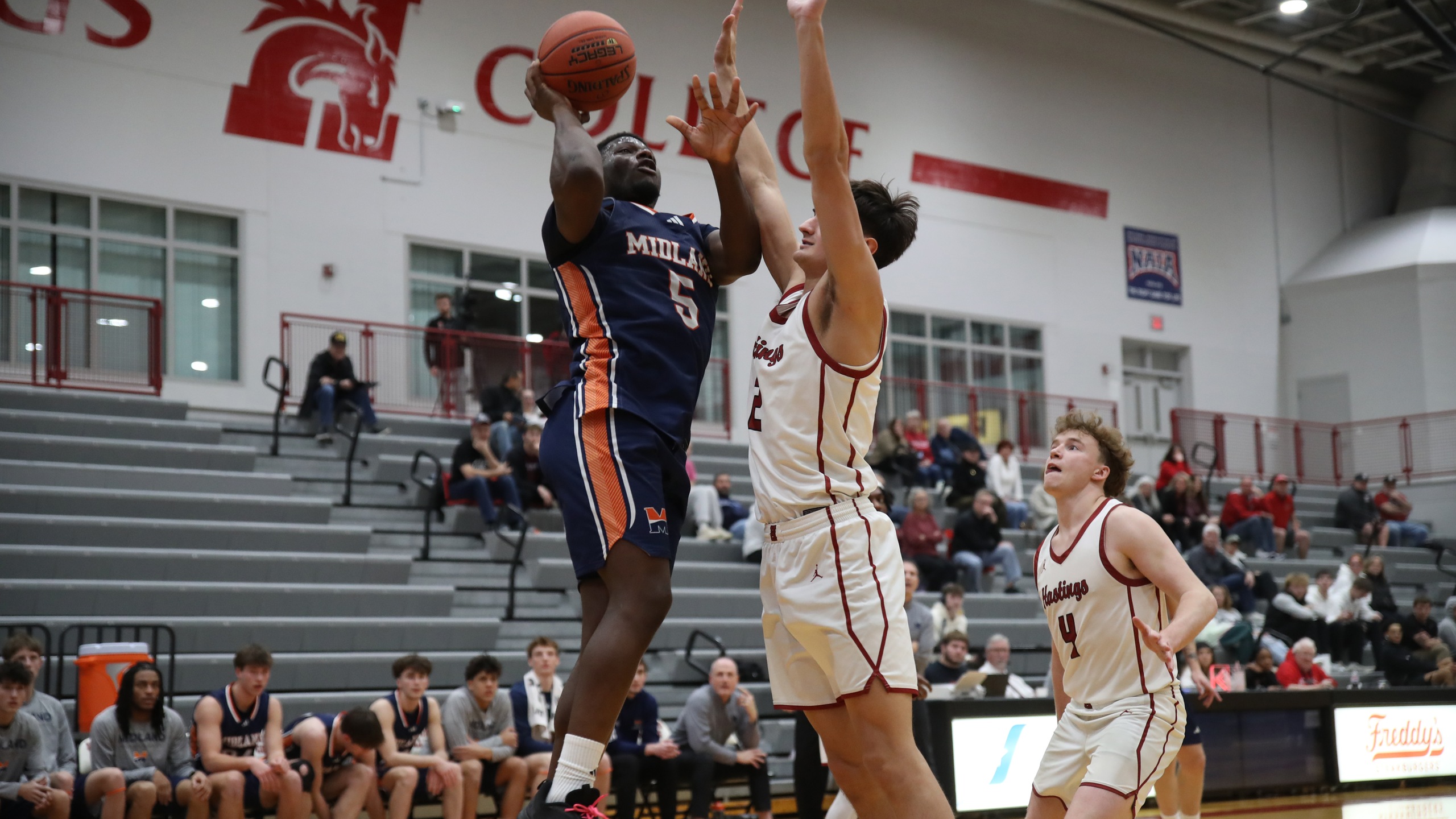 Early Run Dooms Midland in Road Loss at Hastings